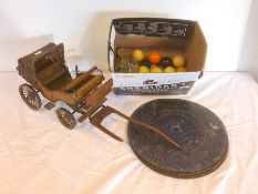 Painted wood and fabric model open carriage, 60cm long, seven metal discs for disc musical box and a