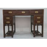 Chinese-style pedestal desk, the rectangular top above three drawers, each pedestal with two drawers