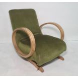 Early 20th century low rocking chair  Condition Reportjoints on the base loose, spring retaining