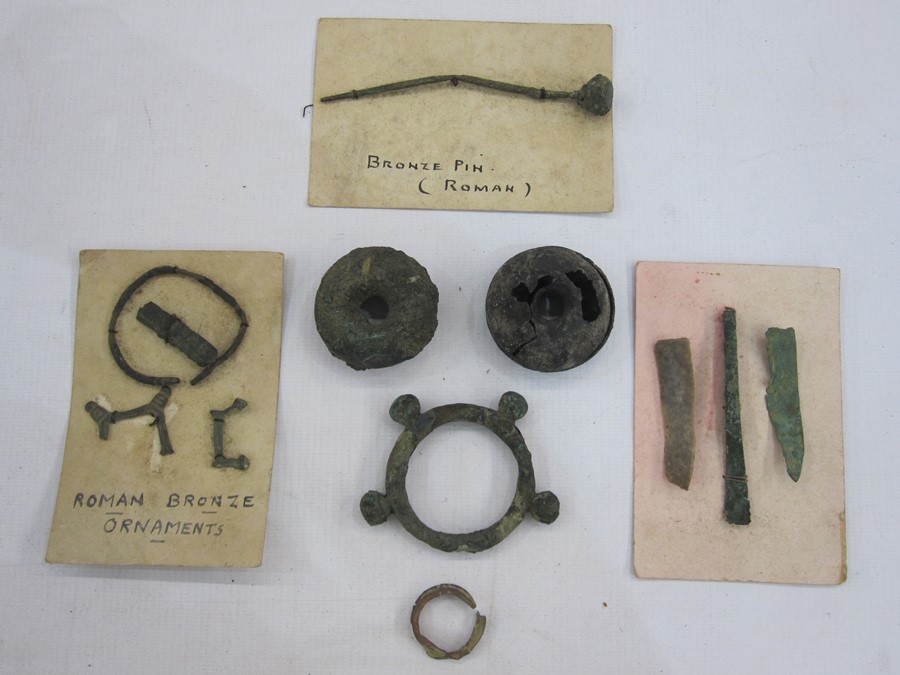 Collection of Roman and Iron Age bronze objects to include terret ring, Roman bronze pin,