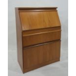 20th century teak bureau with single drawer and two cupboard doors, on plinth base, 76.5cm x 107cm