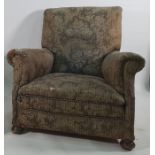 19th century armchair in foliate patterned upholstery, on turned front supports