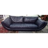 Pair of modern office reception navy blue leather settees, each four-seater and on brushed metal