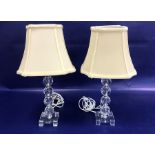 Pair cut glass and chrome table lamps, each with four faceted knops to the column, on square