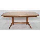 20th century Gordon Russell extending dining table on twin pedestal base united by stretcher