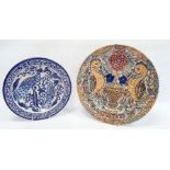 Continental tin glazed earthenware shallow bowl with underglaze blue decoration of exotic birds,