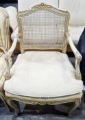 French-style cane-backed and cream painted armchair with upholstered lift-out seat, cabriole legs