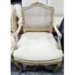 French-style cane-backed and cream painted armchair with upholstered lift-out seat, cabriole legs