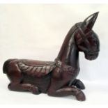 Large dark red stained wood and carved model horse / donkey, possibly South American, with carved