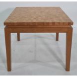 Pair of 1960's parquetry topped coffee tables, each rectangular with block inlaid tops (2)