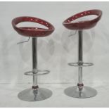 Pair of red seated plastic and chrome based breakfast bar stools (2)  please see additional images