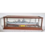 A US battleship BB-63 U.S.S. MISSOURI model ship in rectangular glass display case, 46cm long x 18cm