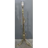 Modern brass standard lamp with scroll decoration