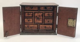 Early 20th century oak table top cabinet, the rectangular top above two drawers with brass