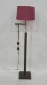 Modern standard lamp with bracket arm support with pink shade