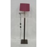 Modern standard lamp with bracket arm support with pink shade