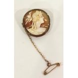 Gold-mounted circular cameo brooch, 2.5cm diameter approx, marks worn possibly 18ct