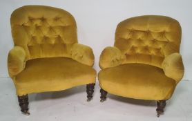 Two 19th century armchairs with yellow ground upholstery, turned front legs to castors