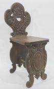 Unusual side chair with carved oak backsplat with green man mask
