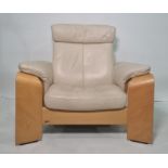 Ekorness three-seat sofa and single armchair in cream ground leather (2)