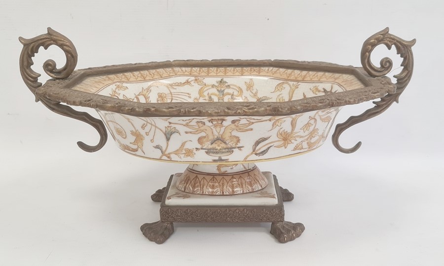 Reproduction gilt metal mounted porcelain pedestal bowl with scroll handles, shaped oval,