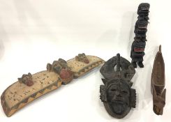 African carved wood mask with headdress, indigenous painted and carved wood model totem pole with