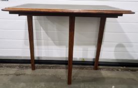 Unusual mahogany and leather-topped side table on three legs, 76cm x 63cm Condition Reportappears to