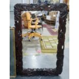 Rectangular mirror in the Chinese-style with carved frame, 58cm x 90cm