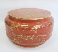 Chinese lacquered wood dowry box and cover, circular, red ground with peacock and flowering branch