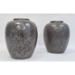 Two Poole pottery vases, black calypso lustre pattern, marked to base, 21cm high (2)