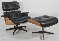 In the manner of Charles & Ray Eames Vitra 'Lounge' chair and ottoman in black leather upholstery (