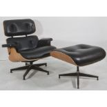 In the manner of Charles & Ray Eames Vitra 'Lounge' chair and ottoman in black leather upholstery (