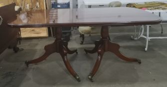 Modern mahogany extending dining table, by Frank Hudson,  with moulded edge, on twin pedestal
