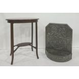 Pewter firescreen with foliate decoration to the rectangular back, with canted top corners, demi-