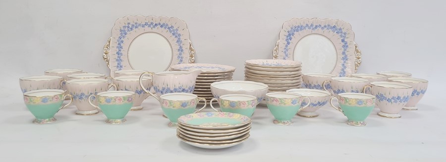 Foley china part tea service, pink ground decorated with blue flowers and a set of six Foley china