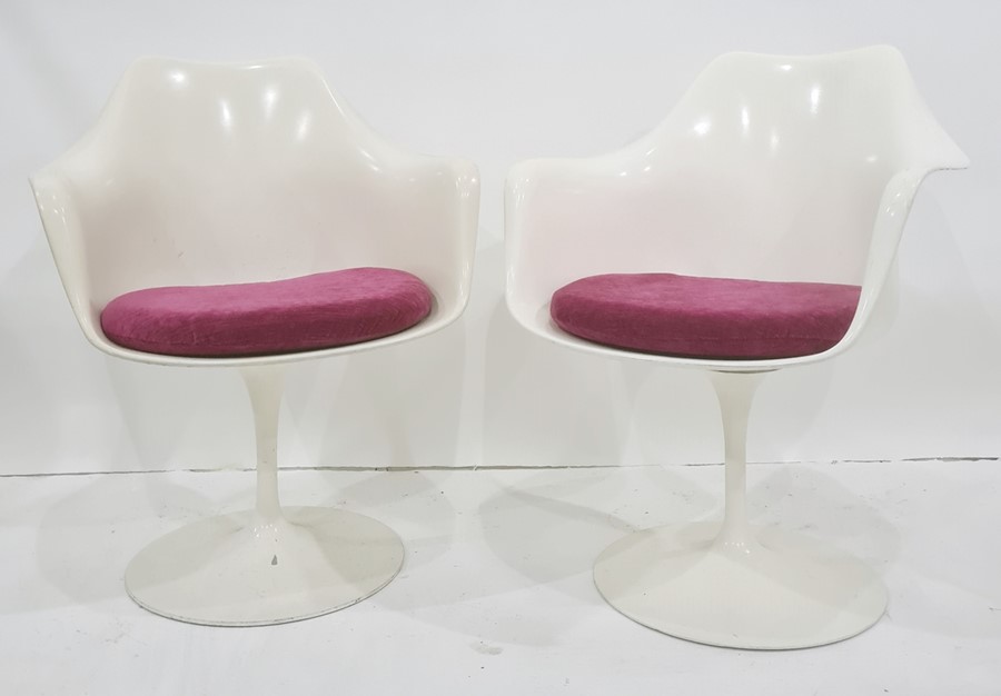 Pair of Eero Saarinen design white plastic chairs