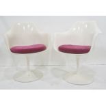Pair of Eero Saarinen design white plastic chairs