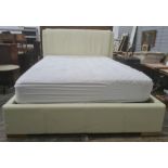 Double bed with cream upholstered headboard, lift-up base, with mattress, 52" wide approx and a baby