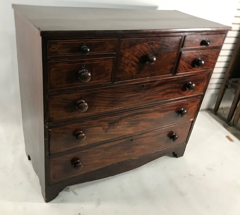 Scottish mahogany chest of drawers, the rectangular top with plain edge above central bonnet drawer,