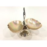 Edwardian silver-mounted and mother-of-pearl shell small pedestal bonbon dish, the heart-shaped loop