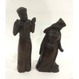 Pair antique carved wood figures of a king and queen, possibly Scandinavian, in medieval dress,