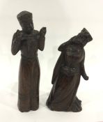 Pair antique carved wood figures of a king and queen, possibly Scandinavian, in medieval dress,