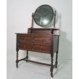 20th century oak dressing chest, the circular mirror on barleytwist supports above two drawers,