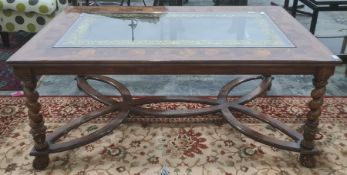 Modern rectangular oyster walnut and glass-topped coffee table on barleytwist and carved supports,