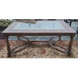 Modern rectangular oyster walnut and glass-topped coffee table on barleytwist and carved supports,