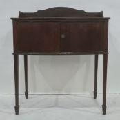 Late 19th/early 20th century mahogany washstand with three-quarter gallery top above the bow