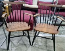 Pair of Danish, possibly Thomas Harlev for Farstrup, teak and black stained stickback carver chairs,