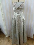 1950's brocade strapless evening dress with pintucks to bodice and crossover with stiff petticoat