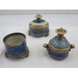 Three studio pottery pieces by Eleanor Newell, three lidded pots in blue and cream (one lid missing)