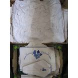 Quantity of assorted table linen to include tablecloths, napkins, place mats, etc (2 boxes)